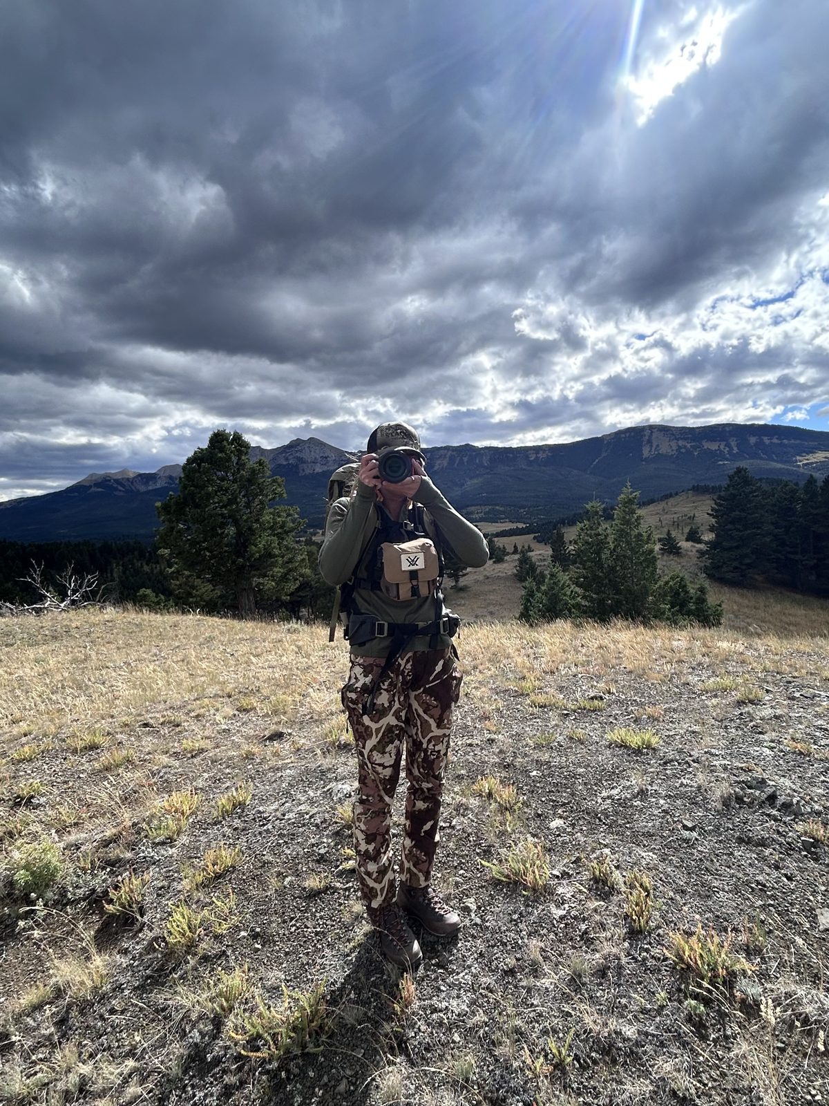 Mckayla shooting on a ridge outside Bozeman